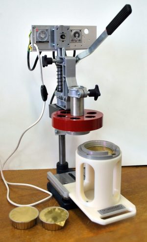 Установка УСС-2Р(Н) для запайки фольгой стаканчиков из аналога ламистера